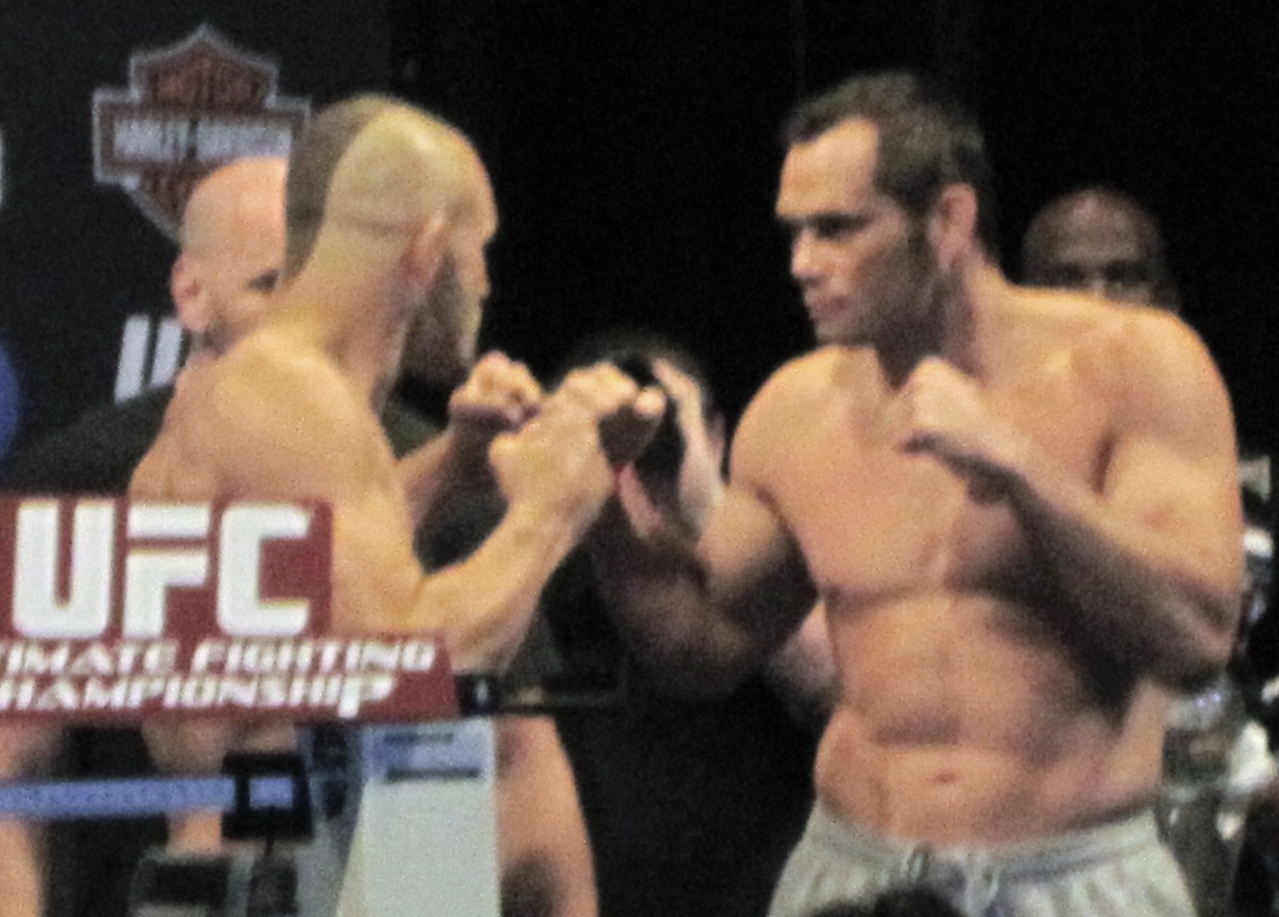 Two UFC fighters facing off at a staredown