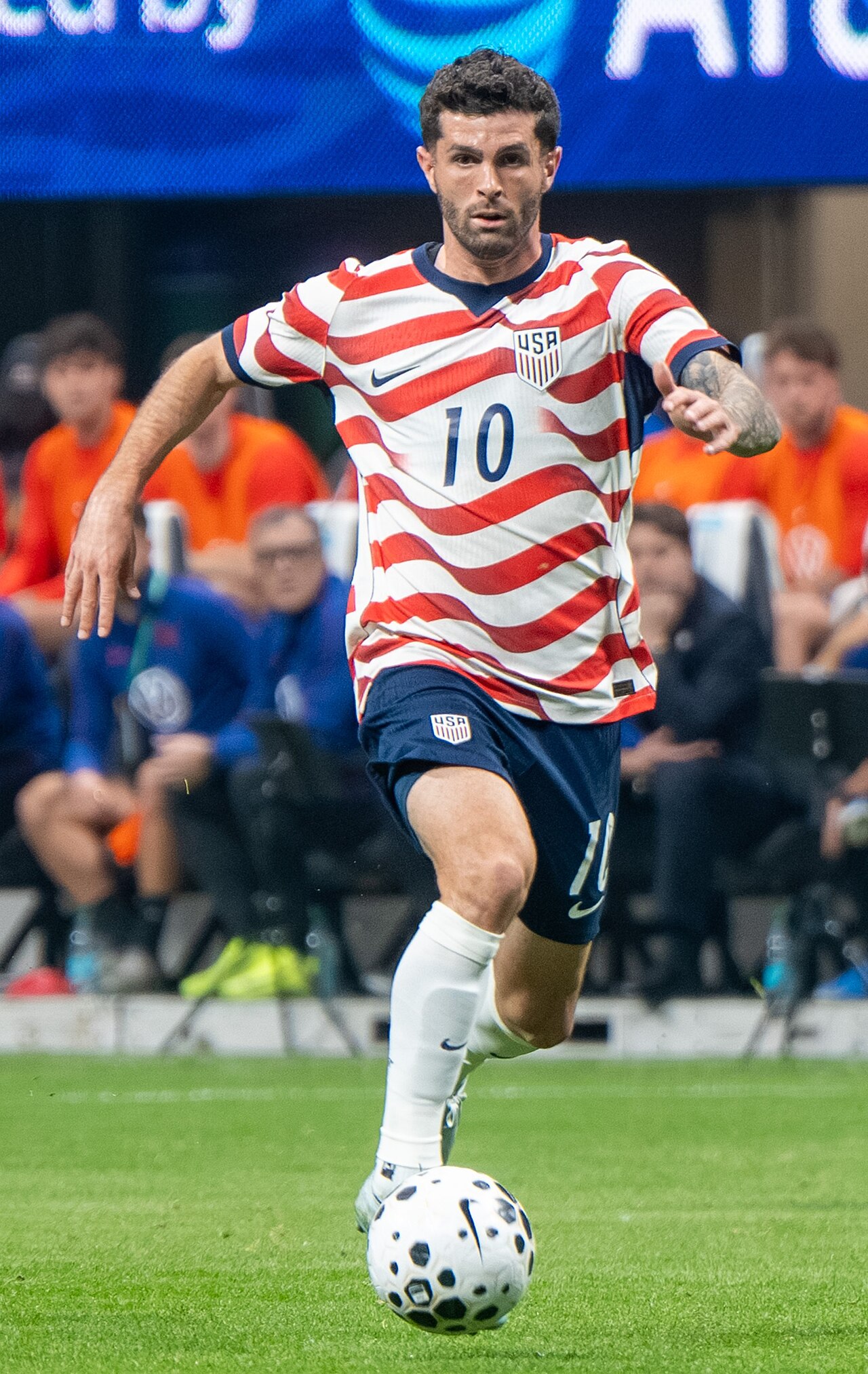 Christian Pulisic carrying the ball for the United States in 2026